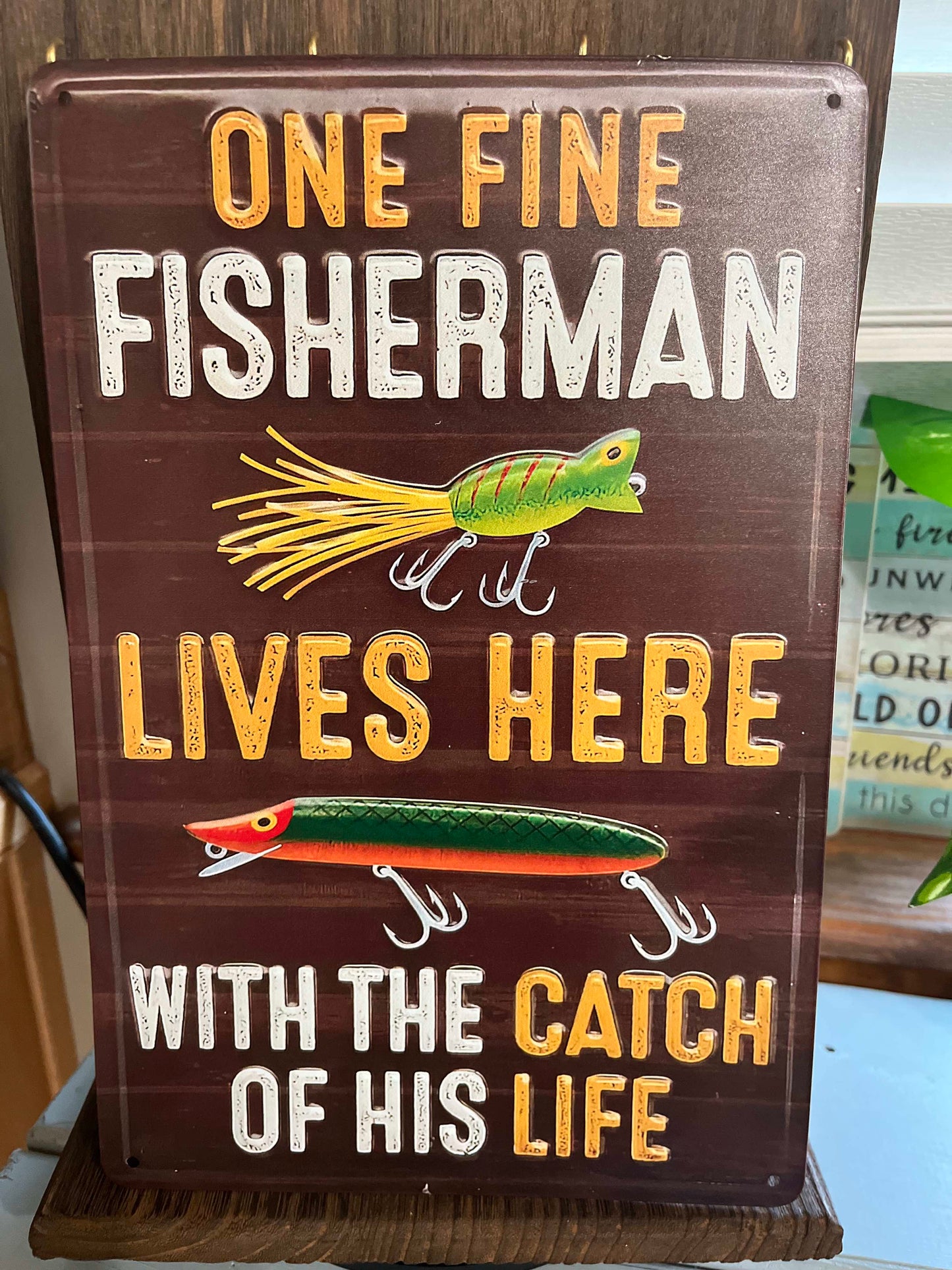 One Fisherman Lives Here With the Catch of His Life Sign